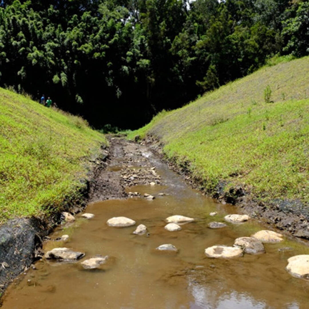 A low creek between two small hills