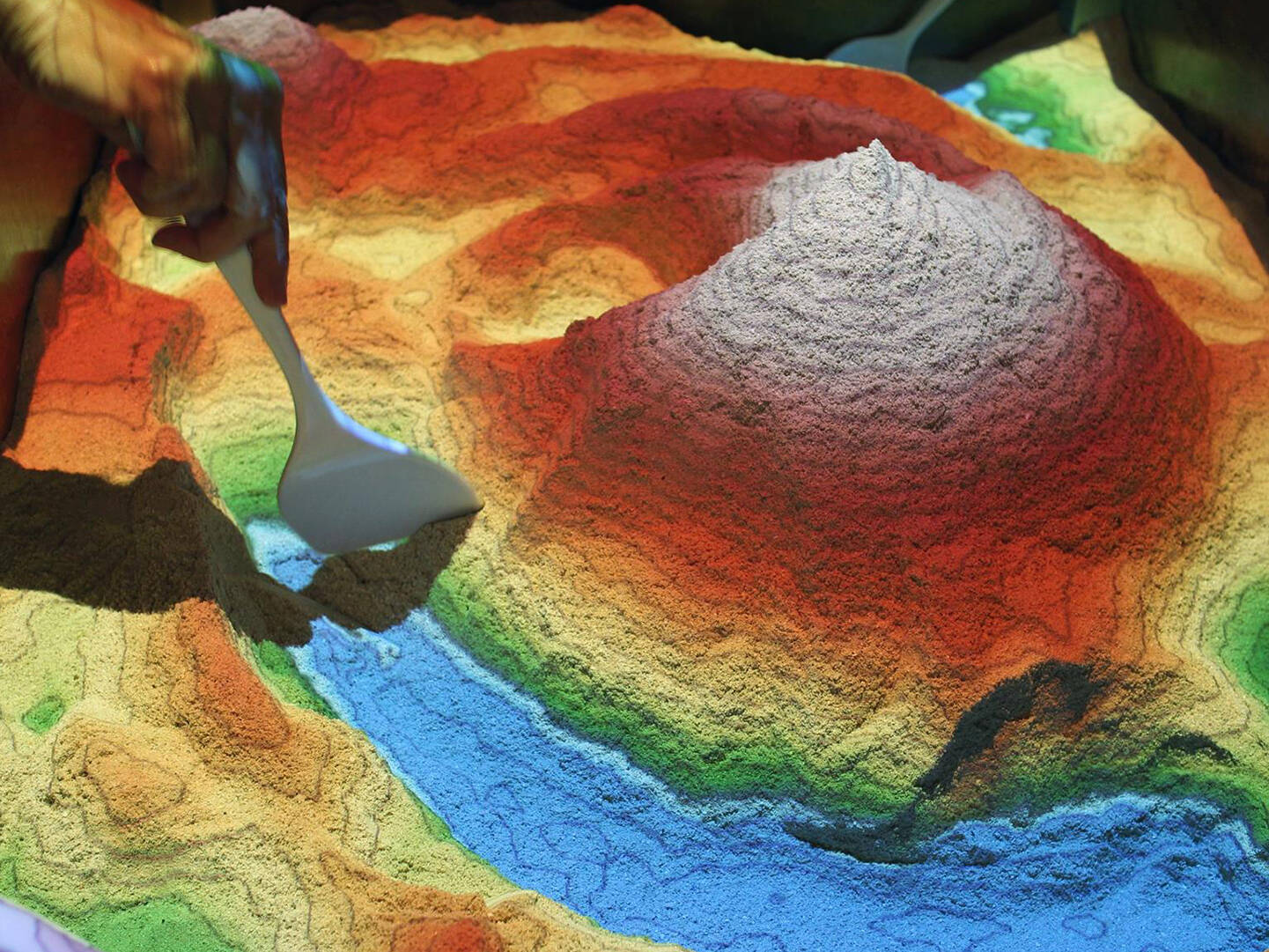 A scale model of a landscape, projected from above on a 3D surface