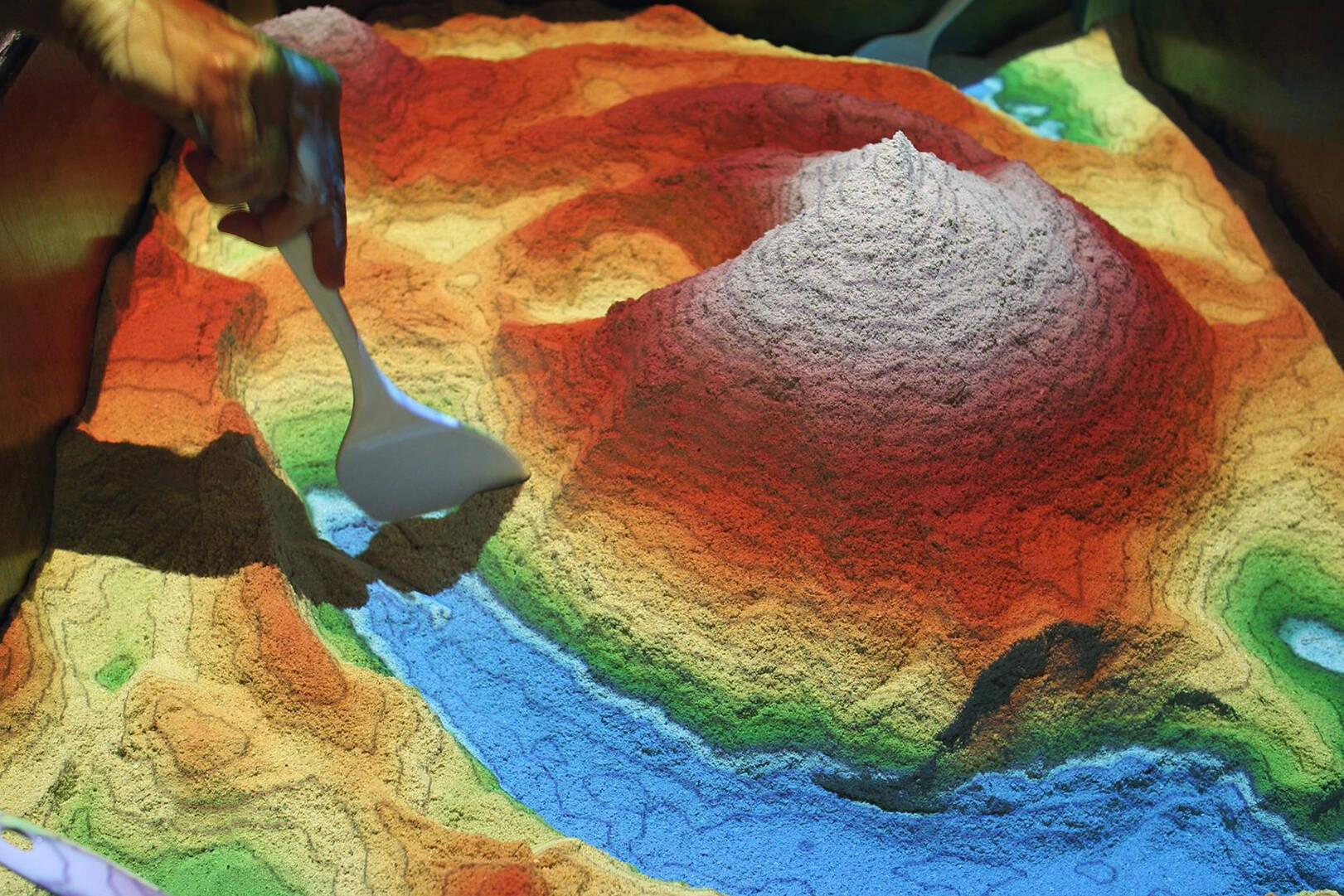 A scale model of a landscape, projected from above on a 3D surface