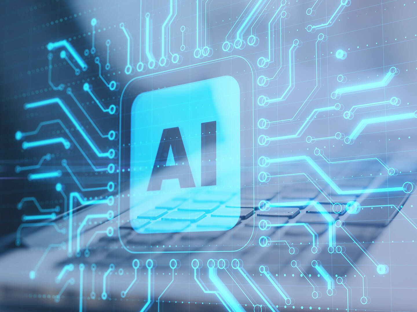 A 3D render of a blue computer chip with AI printed in the middle