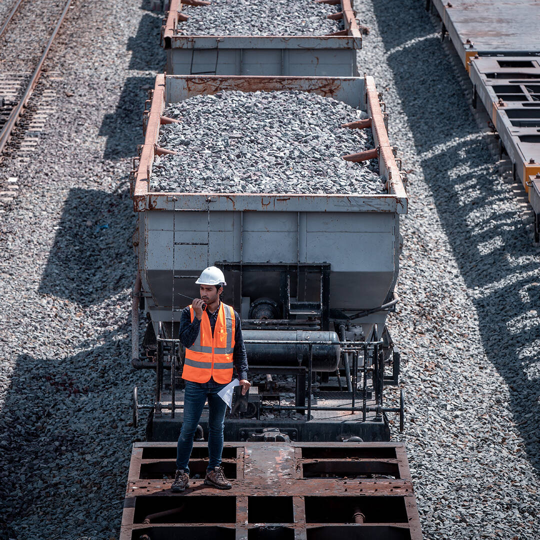 A rail engineer inspecting a railway line