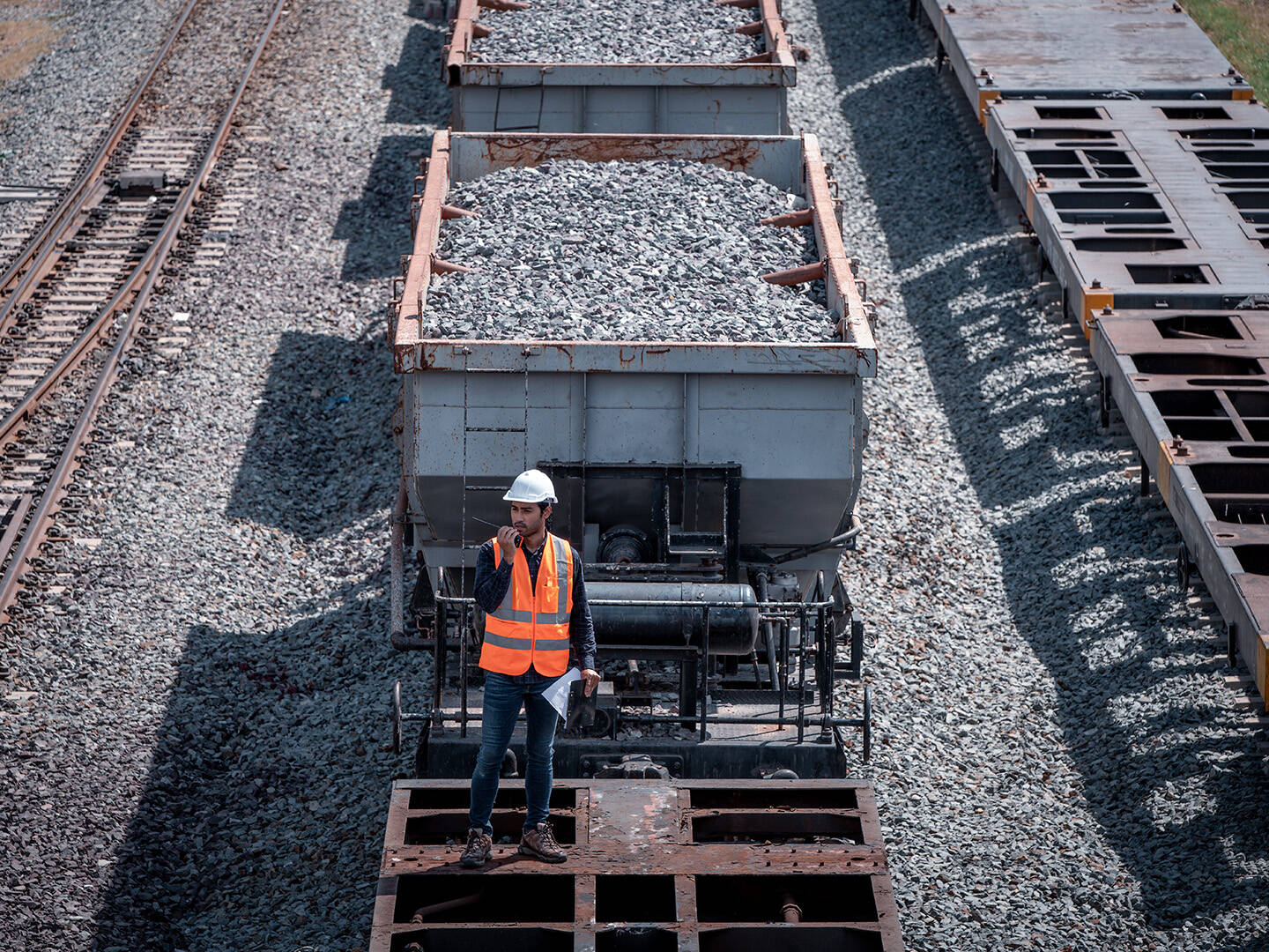 A rail engineer inspecting a railway line