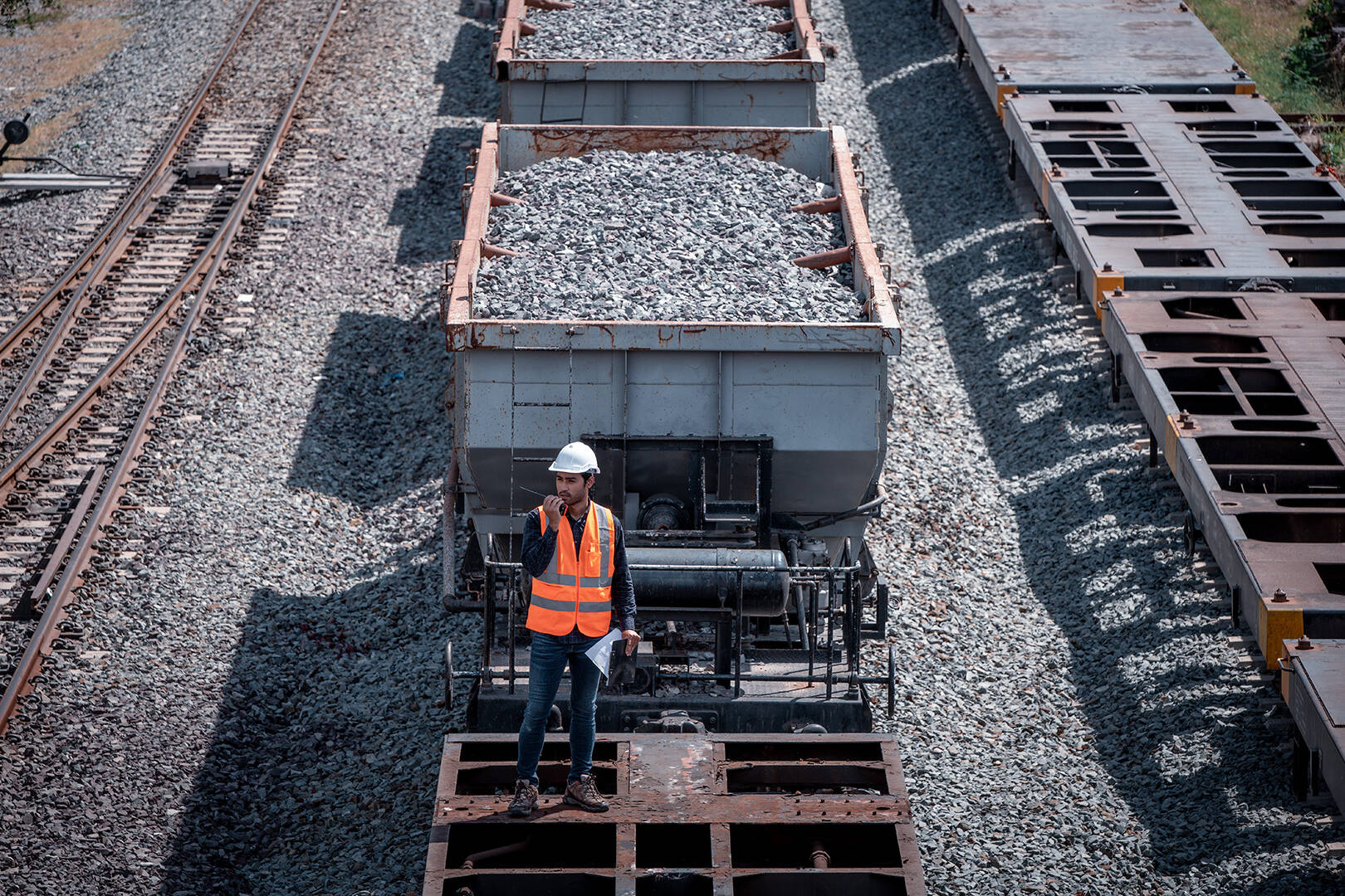 A rail engineer inspecting a railway line