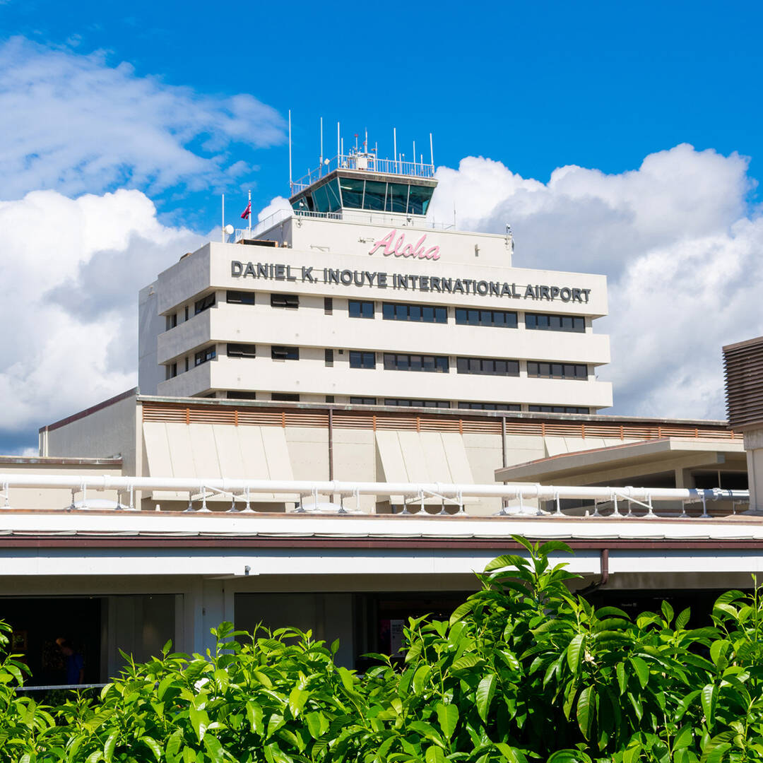A white air traffic control tower with the words 