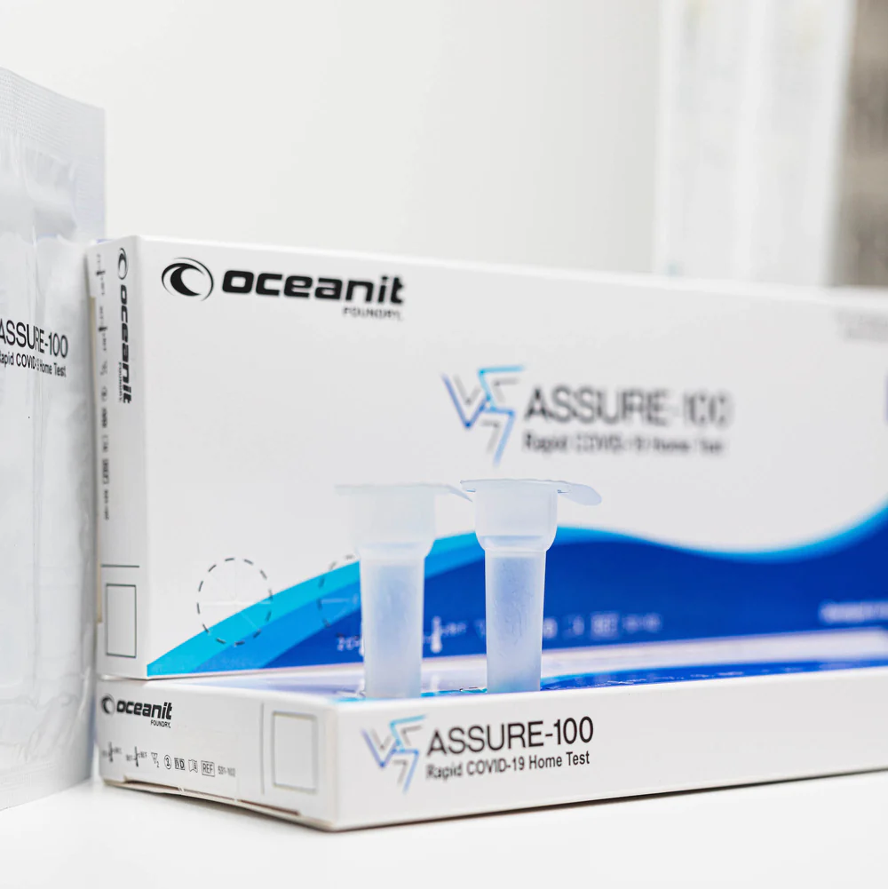 An Assure-100 COVID test kit box