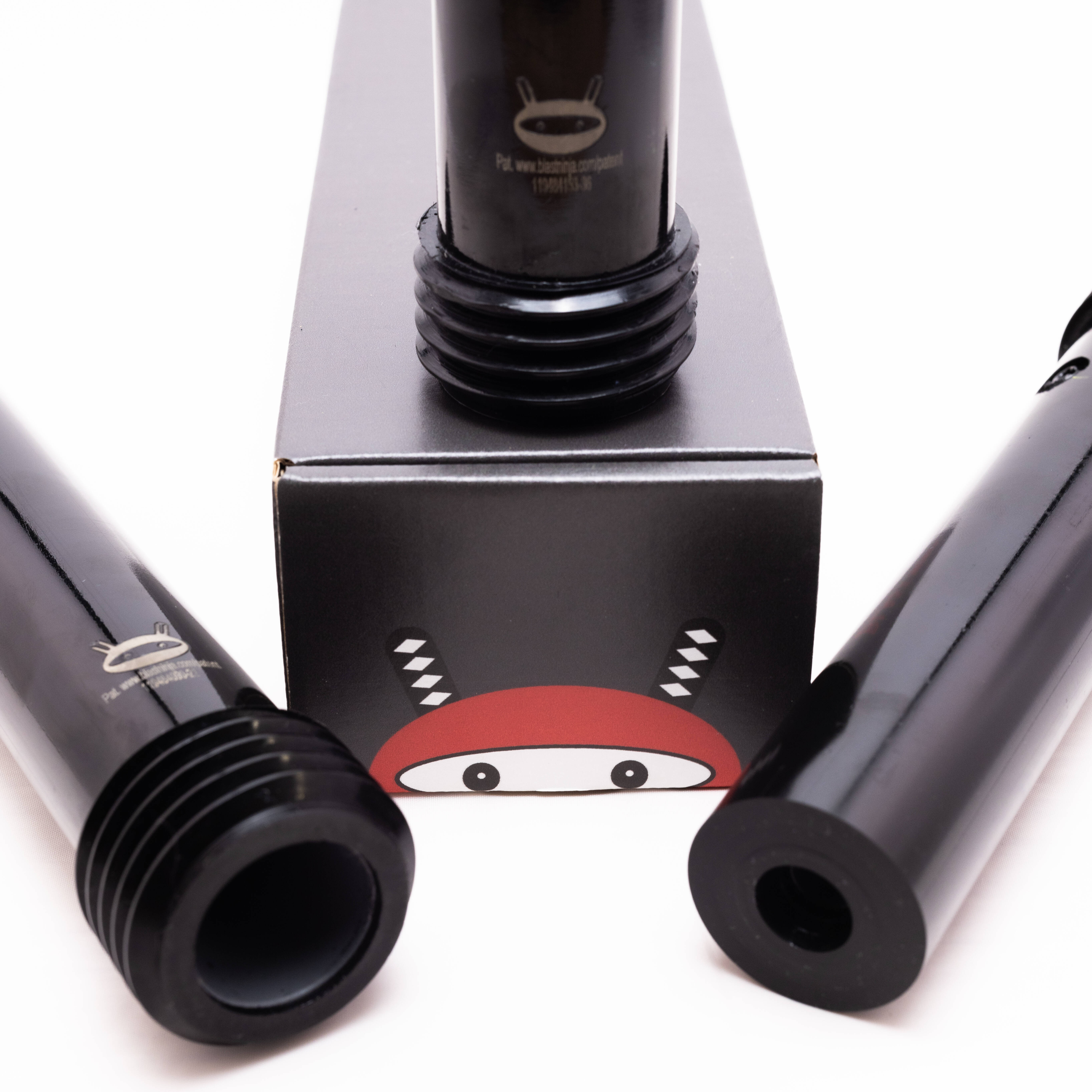 A blast ninja nozzle set on top of its box