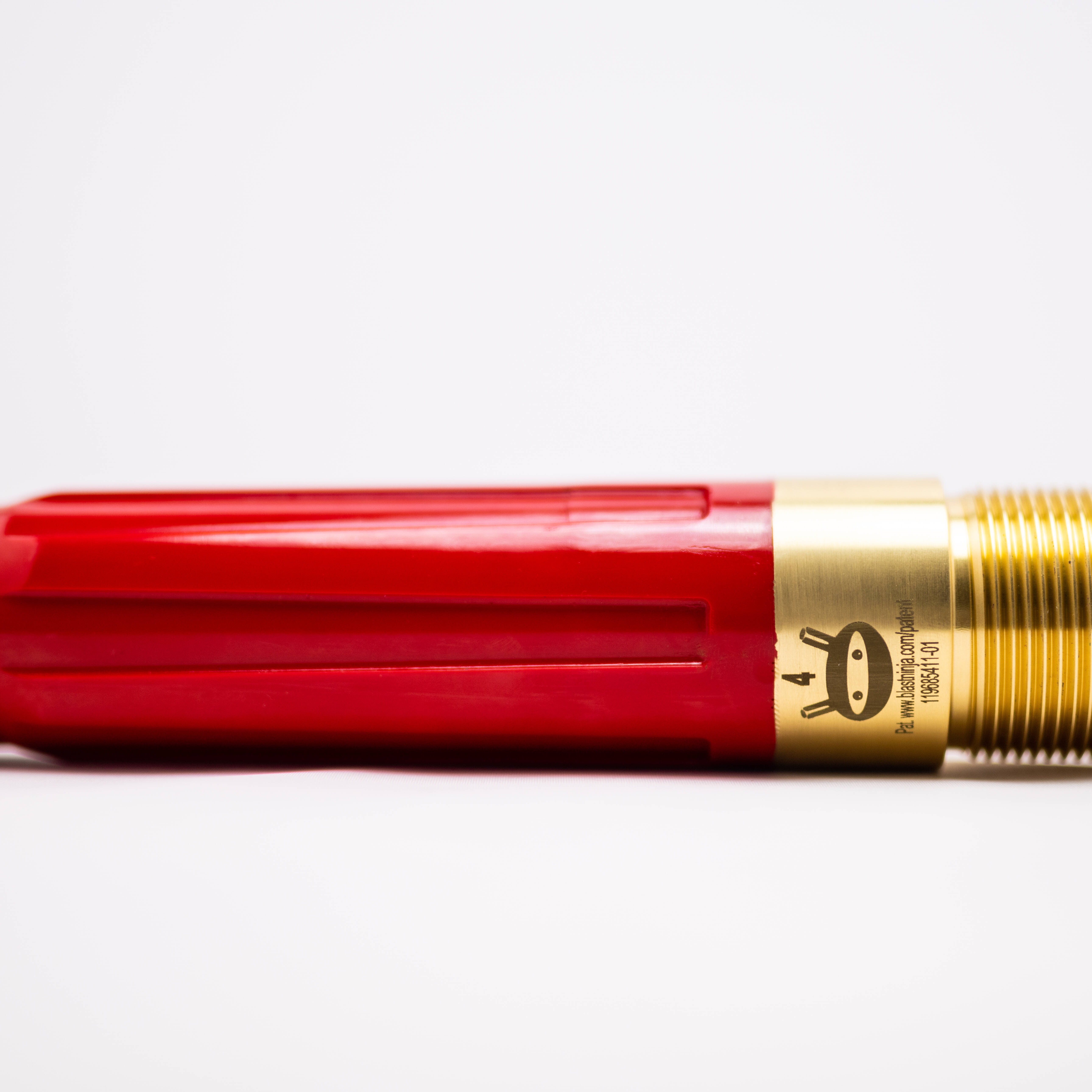 One red Blast Ninja nozzle on its side