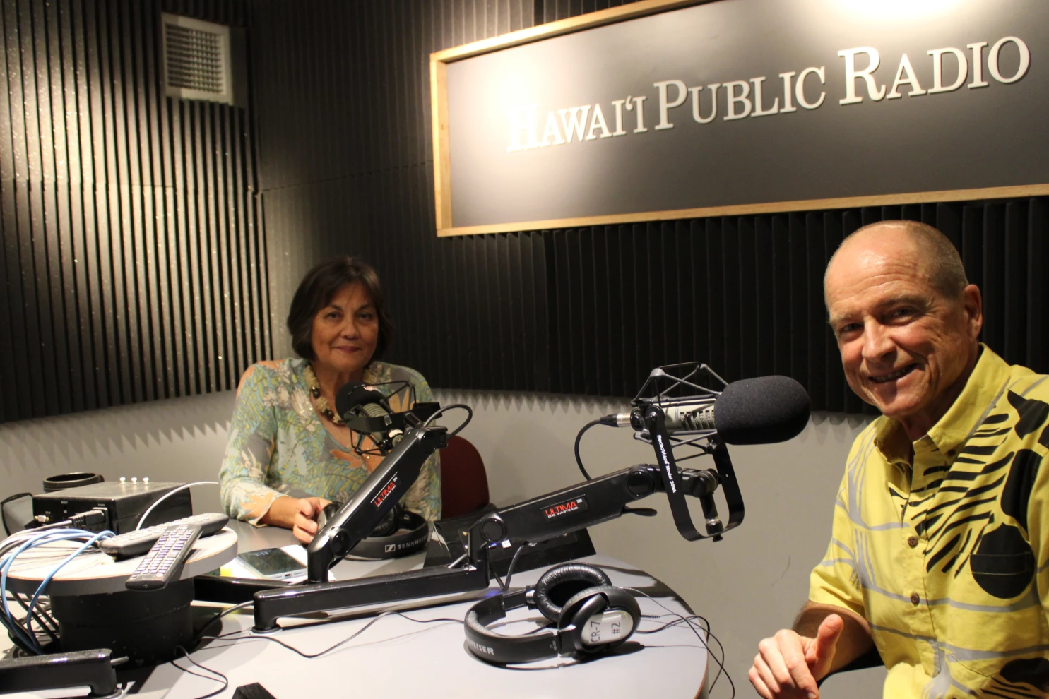 Patrick Sullivan posing for a photo while recording a podcast at Hawaii Public Radio