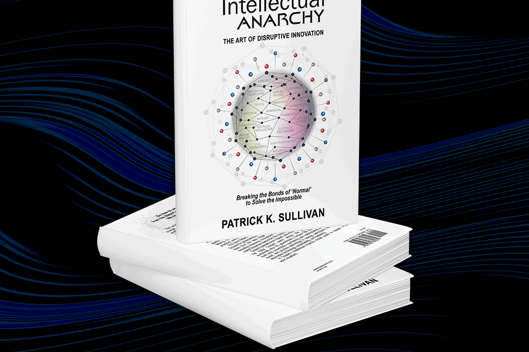 Mockups of a stack of Intellectual Anarchy books, a white cover with an illustration of a nucleus with scientific language