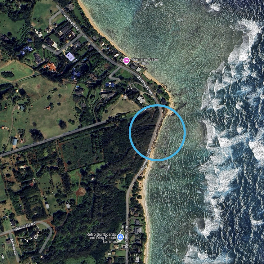 A satellite view of Aliomanu Road, with a portion of eroded shoreline circled