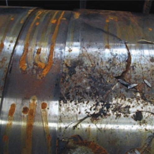 A rusty, damaged pipeline