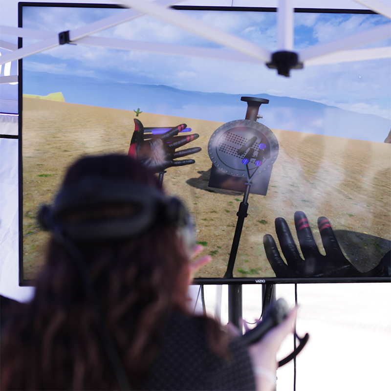 A woman using augmented reality to fly a drone