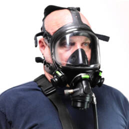 A man wearing a universal breathing mask