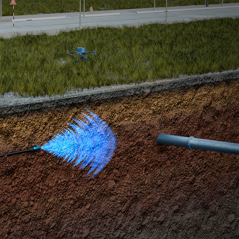 A 3D render of a sensor moving horizontally through the ground, approaching a pipeline, with a drone hovering aboveground