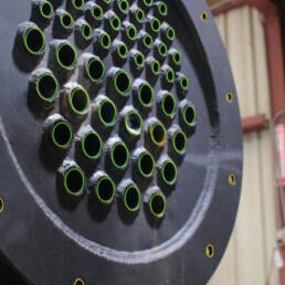 A close up of openings on a heat exchanger