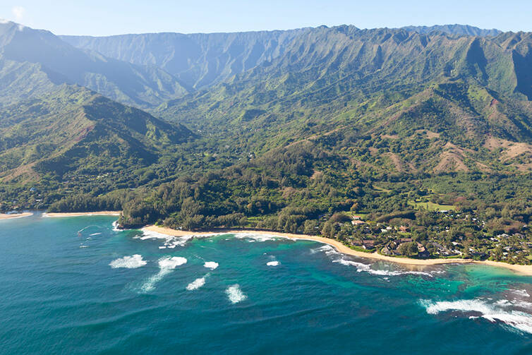 An aerial photo of Oahu's coastline and mountains