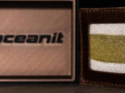 A knitted swatch of KERTEX in a box labeled Oceanit