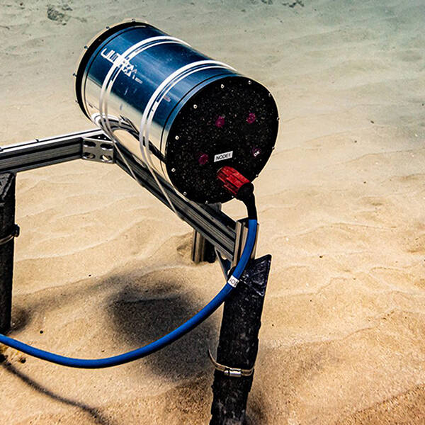 An underwater photo of an ULTRA sensor on the sea floor