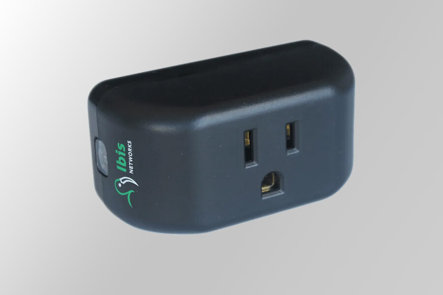 A black smart plug in adapter