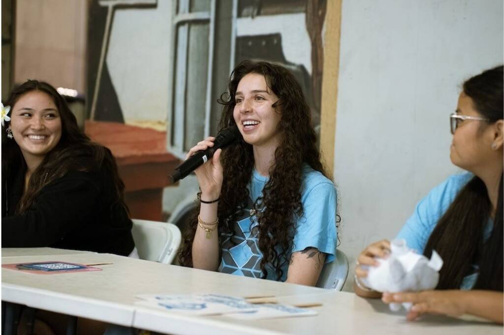 Sophie Bulatovic speaking at an HPU event
